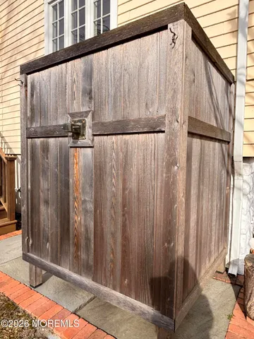 a bathroom with a shower and a sink