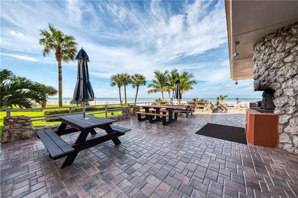 swimming pool with outdoor seating