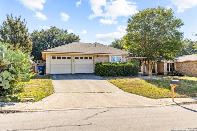 a house with swimming pool in front of it