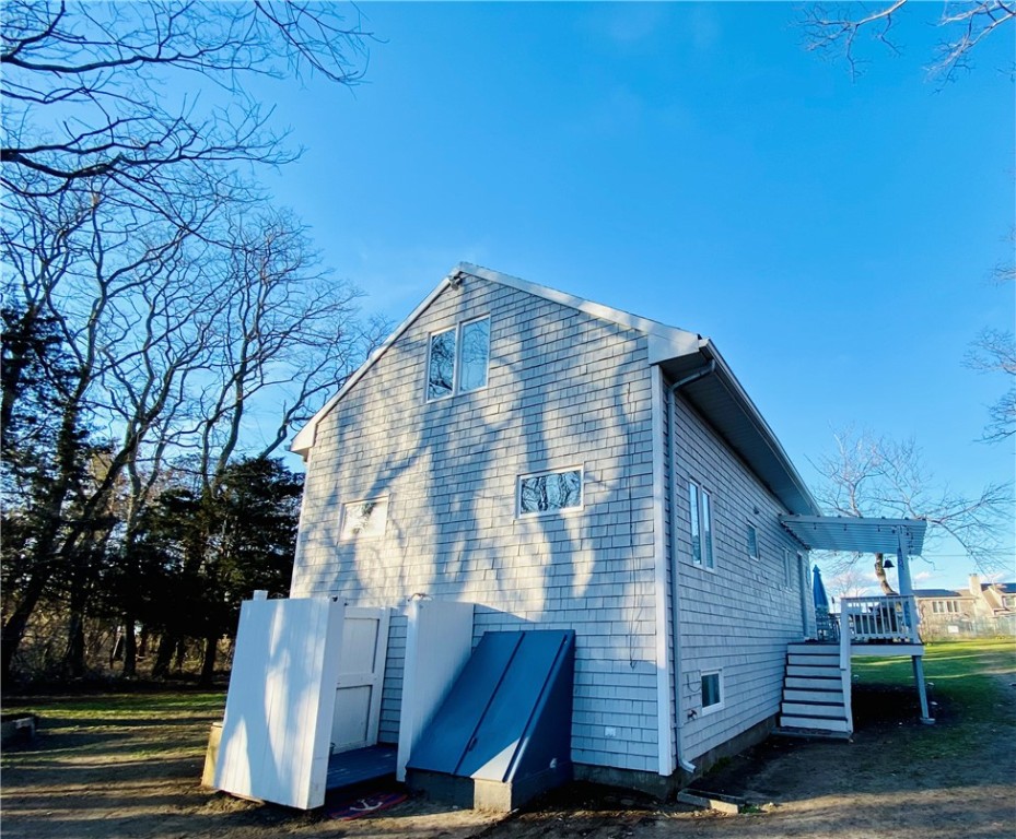 192 Beach Road Prudence Island, RI 02872 - Photo 25 of 36 West Elevation with Outdoor Shower (hot/cold water) and basement access
