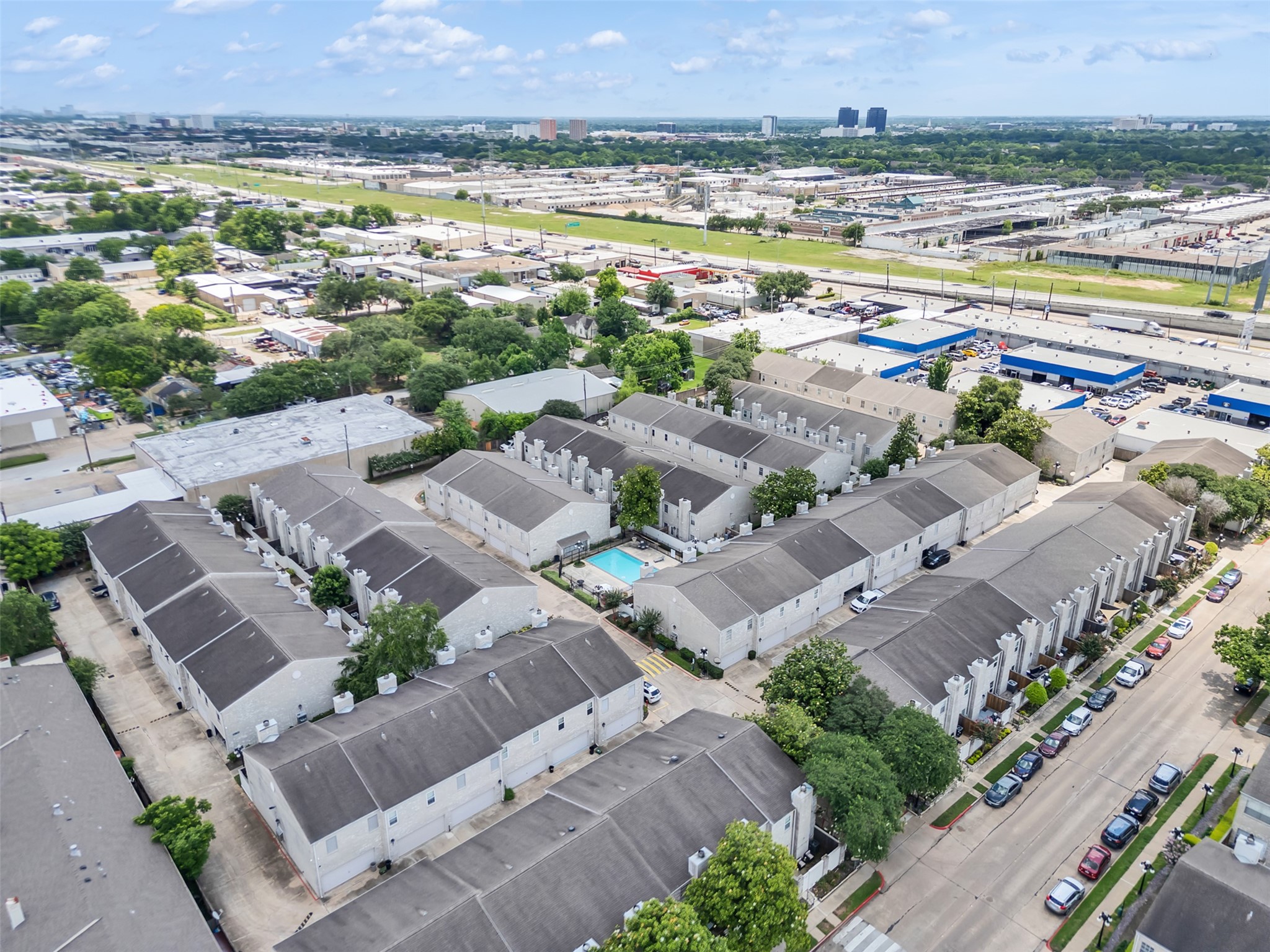 4001 Tanglewilde Street, Unit 605 Houston, TX 77063 - Photo 27 of 29 an aerial view of residential houses with outdoor space and lake view