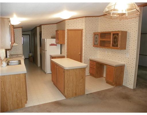 83 Reagan Road Mount Pleasant, PA 15666 - Photo 5 of 12 Kitchen. Make those yummy dishes in your fully equipped kitchen.... refrigerator, stove, and dishwasher. Walk in pantry & center island. Lots of counter space!