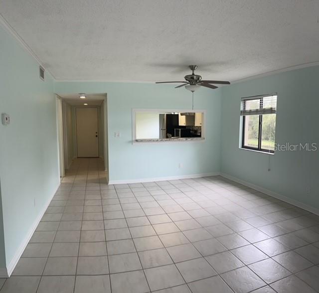 2737 Enterprise Road East, Unit 152 Clearwater, FL 33759 - Photo 22 of 33 a view of an empty room with a window
