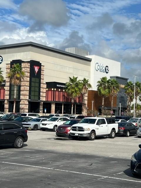 2737 Enterprise Road East, Unit 152 Clearwater, FL 33759 - Photo 29 of 33 a view of a cars park in front of a building