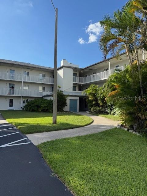 2737 Enterprise Road East, Unit 152 Clearwater, FL 33759 - Photo 3 of 33 a view of a house with a swimming pool