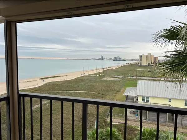 a view of swimming pool from a balcony
