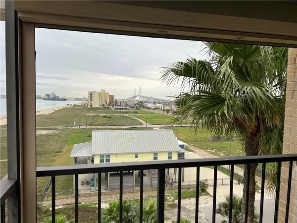 a view of swimming pool from a balcony