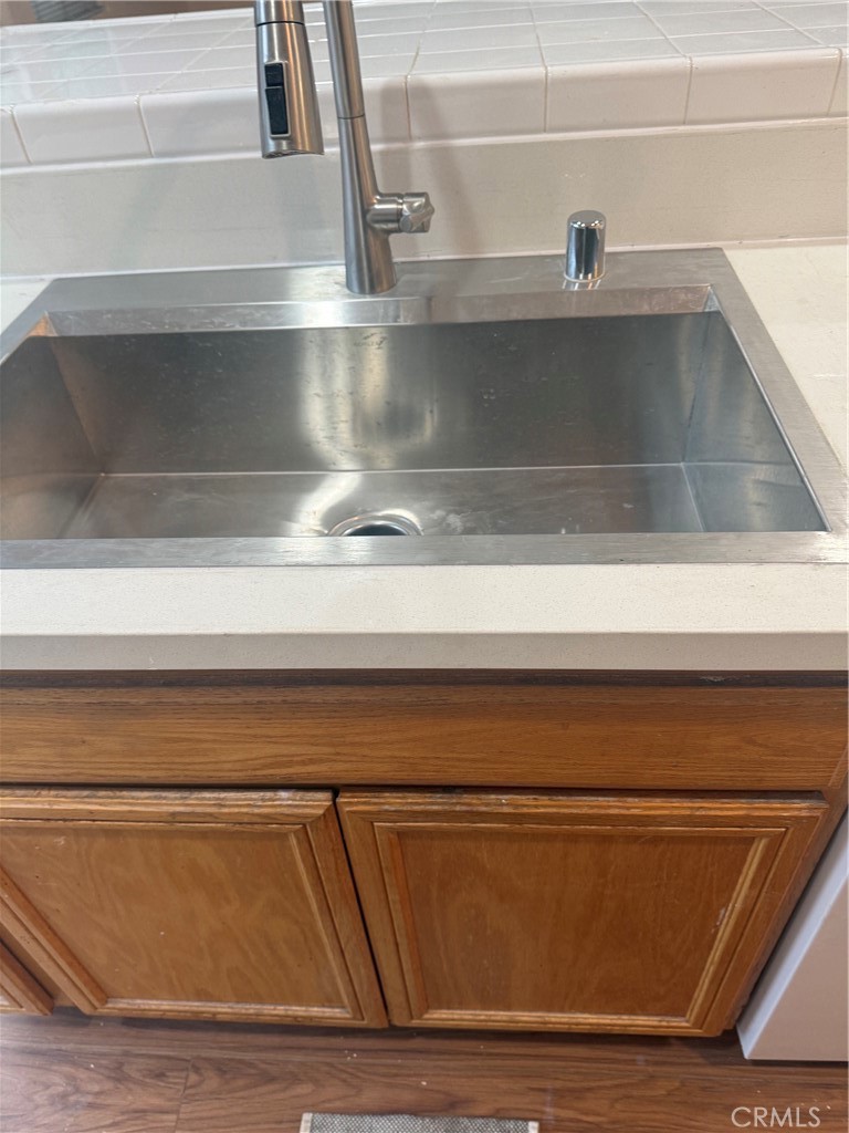 4420 Kristen Court Riverside, CA 92501 - Photo 12 of 39 NEW SINK AND FAUCET NEXT TO DISHWASHER