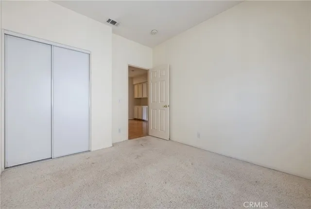 a spacious bathroom with a bathtub sink and mirror