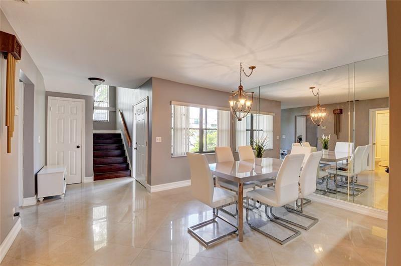 9316 Ketay Circle Boca Raton, FL 33428 - Photo 14 of 30 a dining room with furniture and entryway