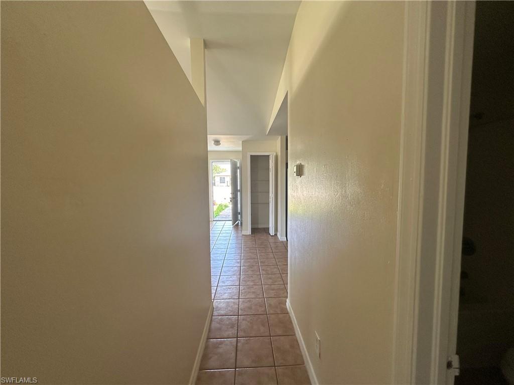 3965 20th Street West Lehigh Acres, FL 33971 - Photo 14 of 18 a view of a hallway