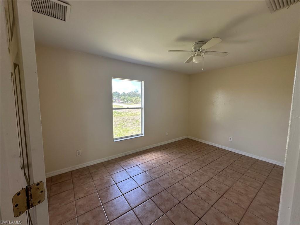 3965 20th Street West Lehigh Acres, FL 33971 - Photo 10 of 18 an empty room with windows