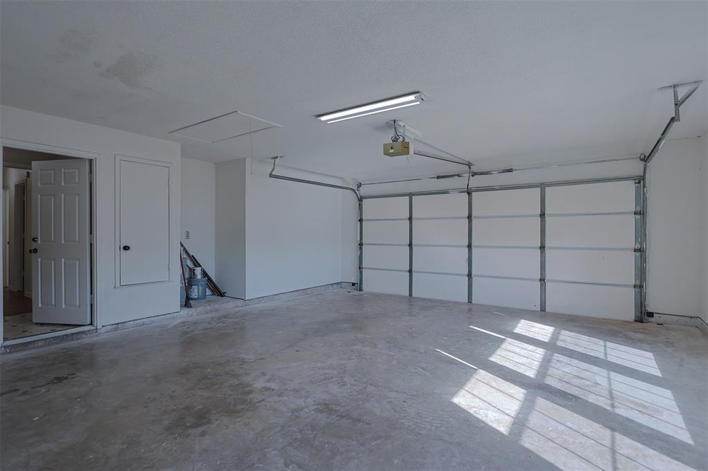 7848 Nine Mile Bridge Road Fort Worth, TX 76135 - Photo 22 of 36 a view of a garage