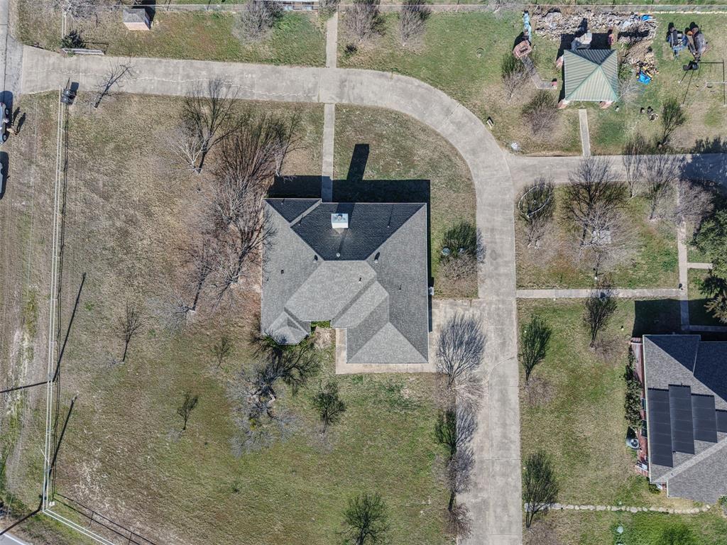 7848 Nine Mile Bridge Road Fort Worth, TX 76135 - Photo 30 of 36 an aerial view of a house with a yard