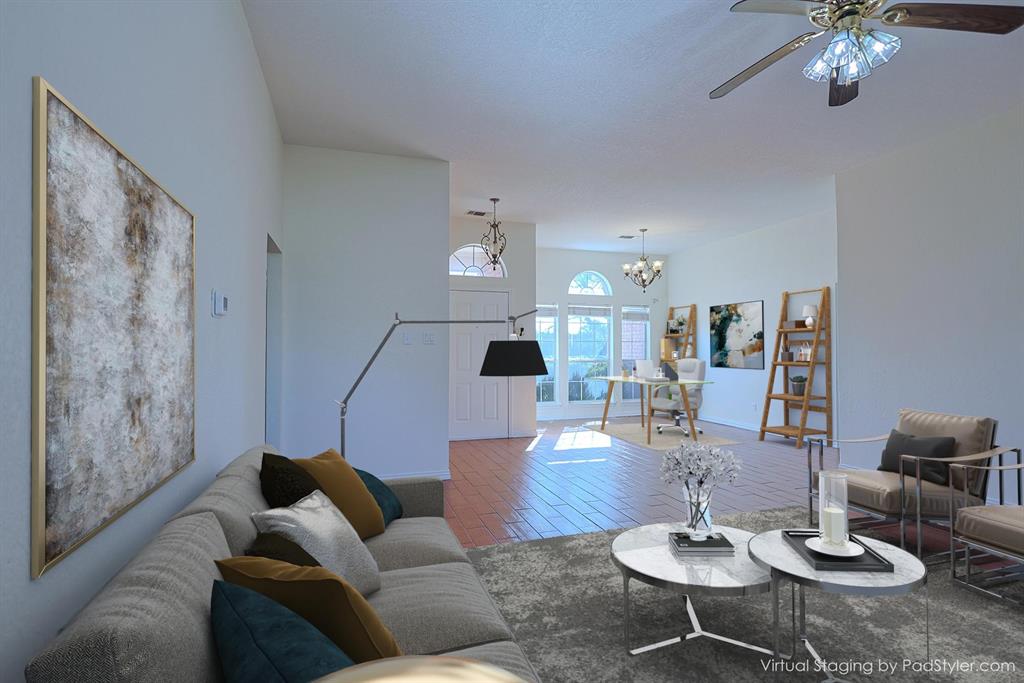 7848 Nine Mile Bridge Road Fort Worth, TX 76135 - Photo 6 of 36 a living room with furniture and a table