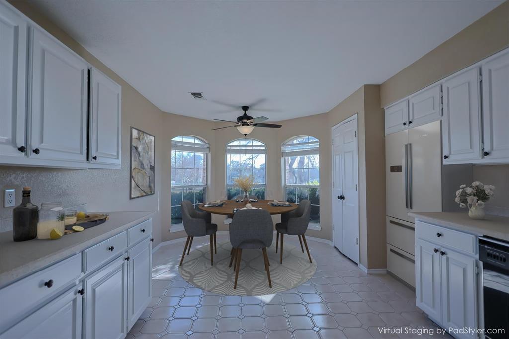 7848 Nine Mile Bridge Road Fort Worth, TX 76135 - Photo 8 of 36 a view of a kitchen and dining room
