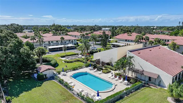 an aerial view of a house with a garden