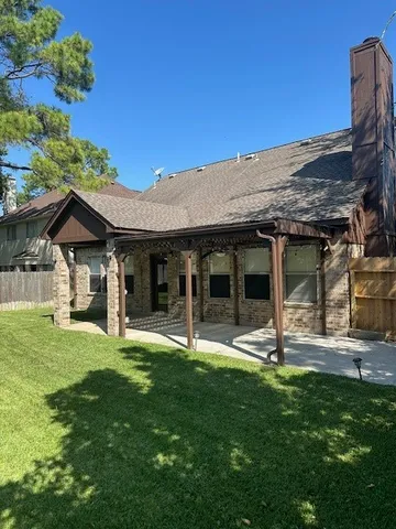 a front view of a house with a garden and porch