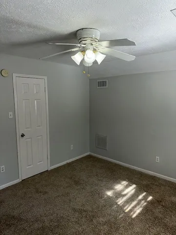 a view of a chandelier in big room
