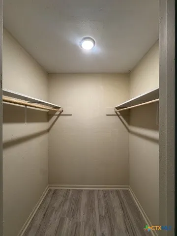 a view of a room with racks on the wall