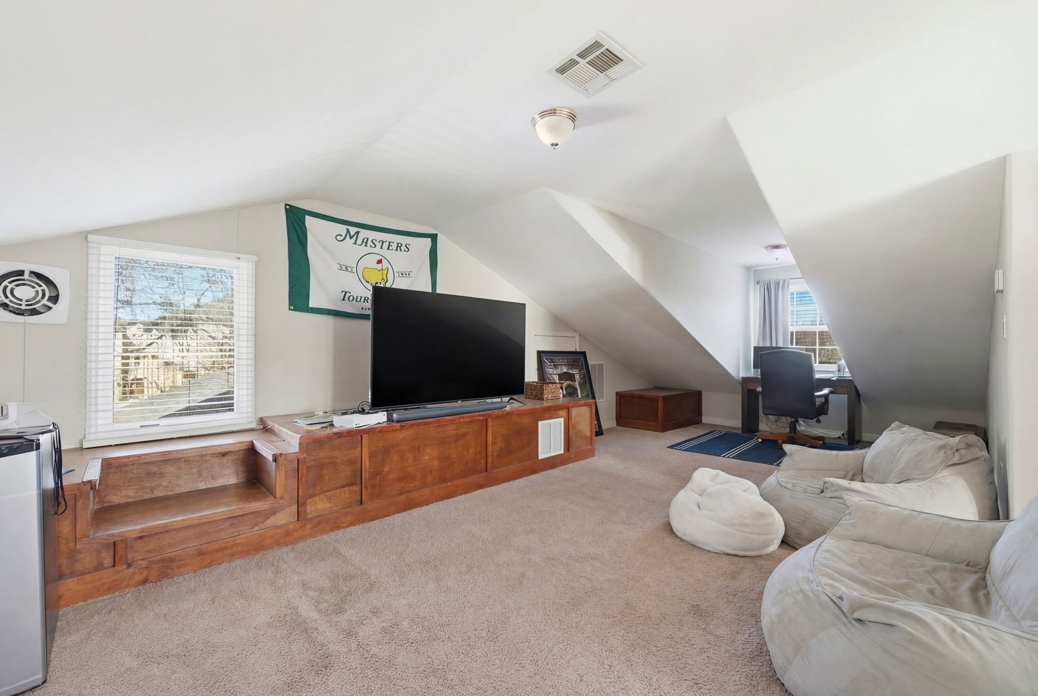 2413 Enfield Road Austin, TX 78703 - Photo 23 of 38 a living room with furniture and a flat screen tv