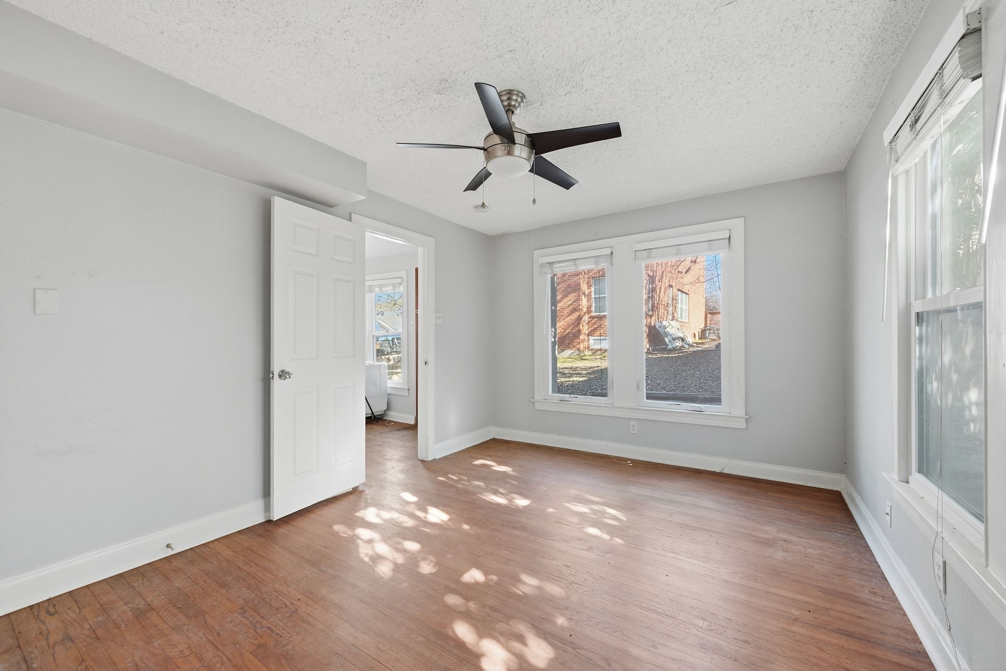 2413 Enfield Road Austin, TX 78703 - Photo 31 of 38 a view of an empty room with a window
