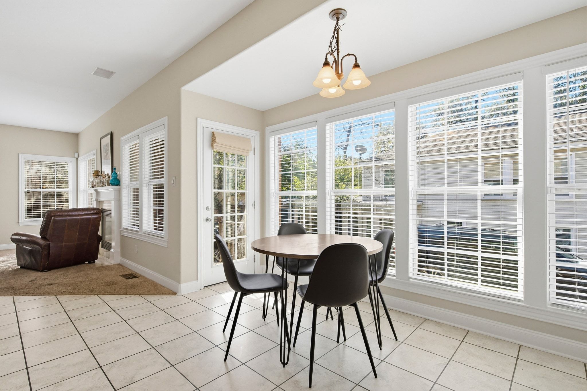 2413 Enfield Road Austin, TX 78703 - Photo 9 of 38 a view of a dining room with furniture windows and wooden floor