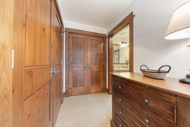 a bathroom with a sink a mirror and a shower
