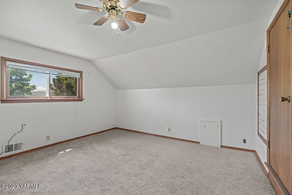 9206 Occidental Road Yakima, WA 98903 - Photo 14 of 23 a view of an empty room with a window