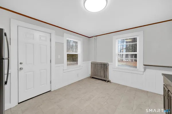 an empty room with windows