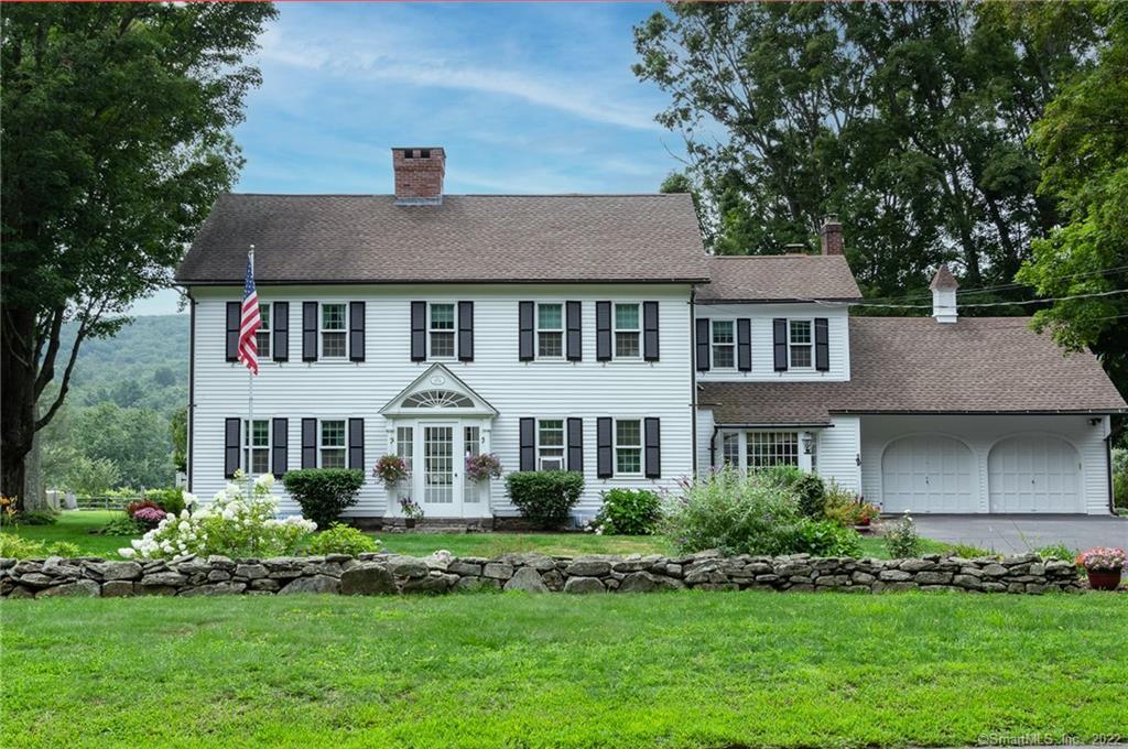 604 Cherry Brook Road Canton, CT 06019 - Photo 1 of 1 a front view of a house with a yard