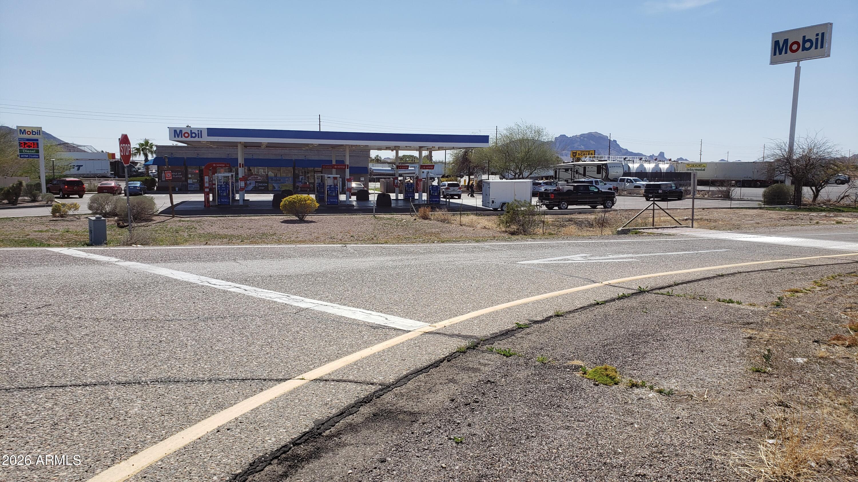 423 West Camelback Road Tonopah, AZ 85354 - Photo 4 of 9 a view of street with cars
