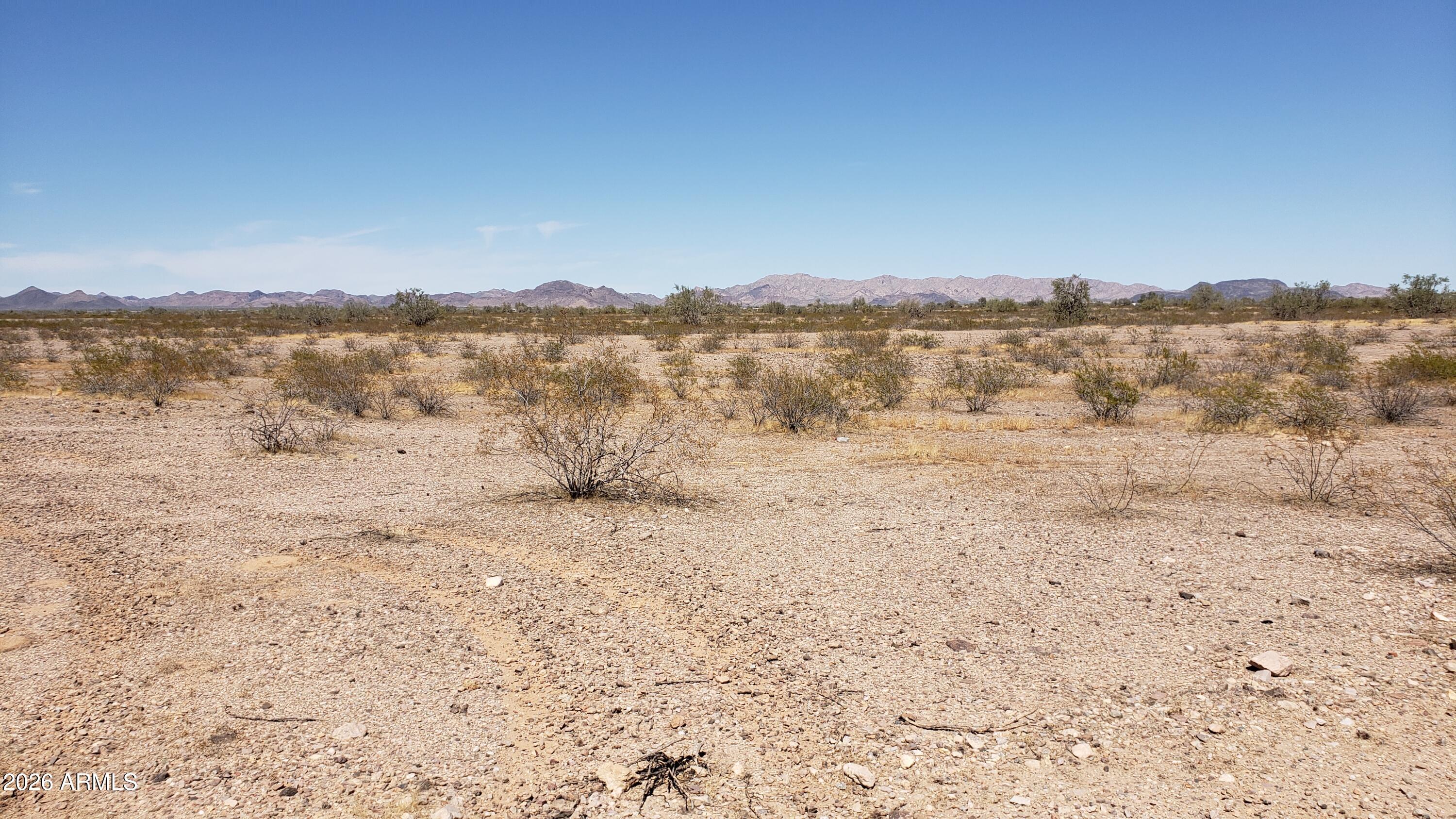 423 West Camelback Road Tonopah, AZ 85354 - Photo 6 of 9 a view of lake with mountain