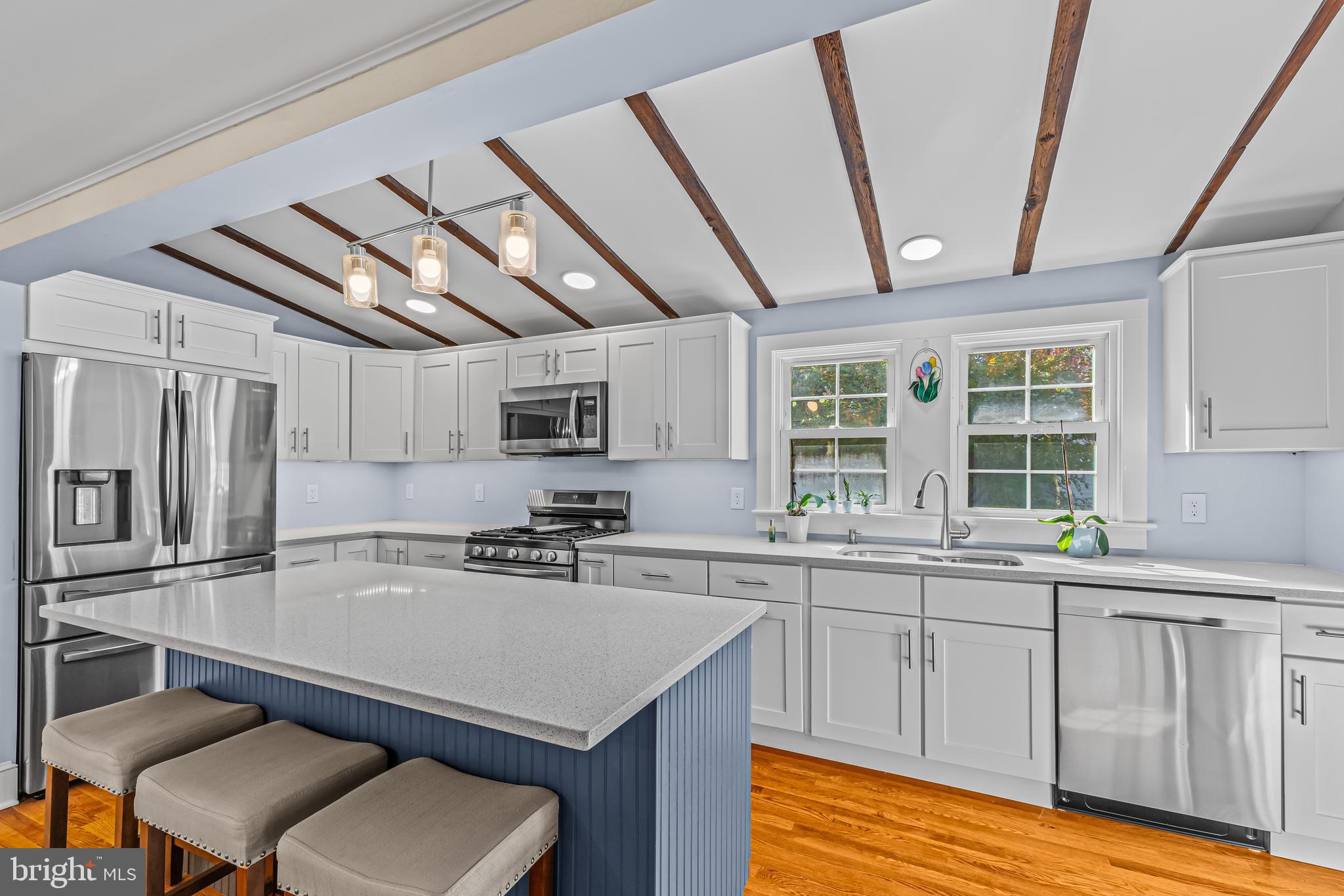 14 Church Street Chesterfield, NJ 08515 - Photo 21 of 25 a kitchen with sink cabinets and wooden floor