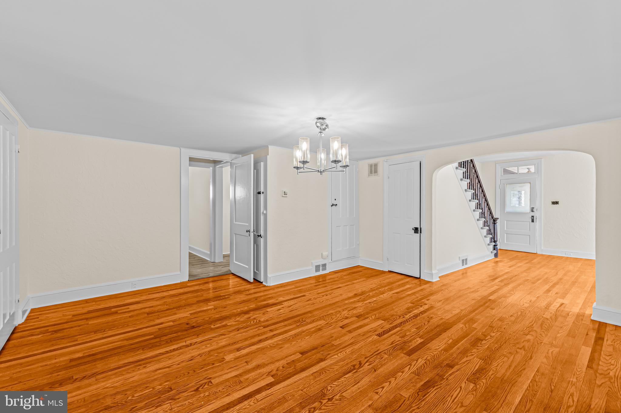 14 Church Street Chesterfield, NJ 08515 - Photo 5 of 25 a bedroom with a bed and a chandelier