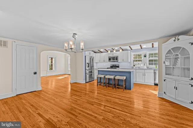 a bedroom with furniture and window
