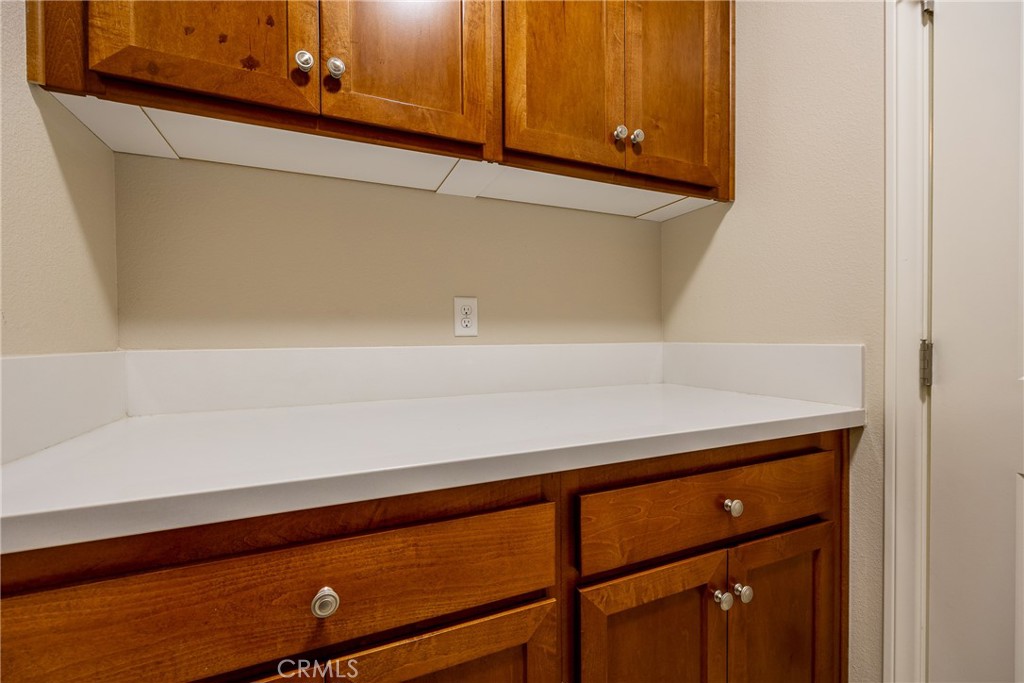 9369 Riberena Circle Atascadero, CA 93422 - Photo 28 of 48 Folding counter and plenty of cabinets for storage.