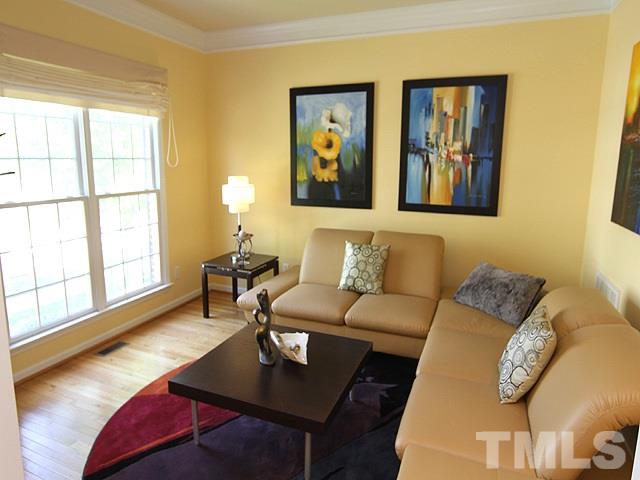 1505 Autumn Ridge Drive Durham, NC 27712 - Photo 2 of 25 a living room with furniture and a window