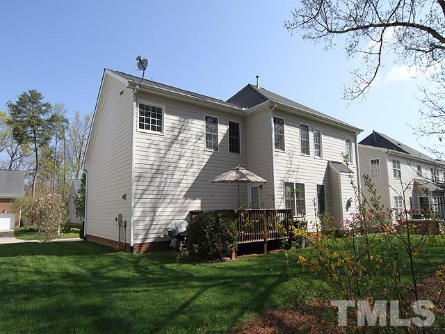 1505 Autumn Ridge Drive Durham, NC 27712 - Photo 25 of 25 a front view of a house with a garden
