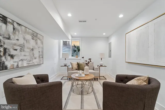 a living room with furniture and a couch