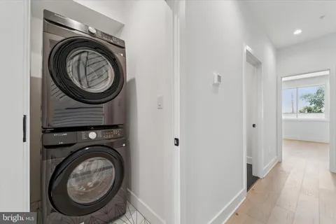 a view of washer and dryer in a utility room