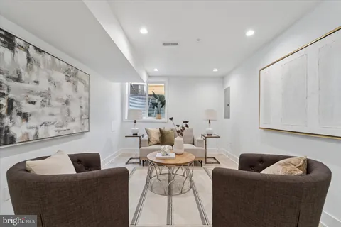 a living room with furniture and a couch