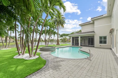 a view of a house with a swimming pool