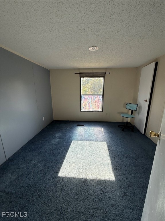 1277 Derby Lane Moore Haven, FL 33471 - Photo 5 of 7 an empty room with windows