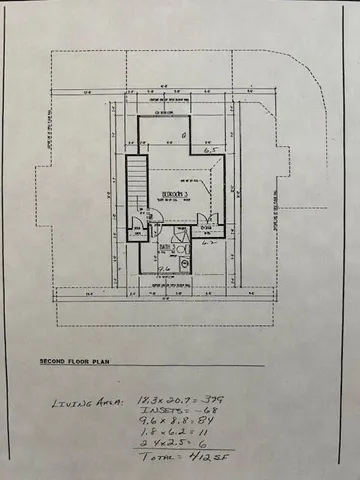 a view of a garden and swimming pool