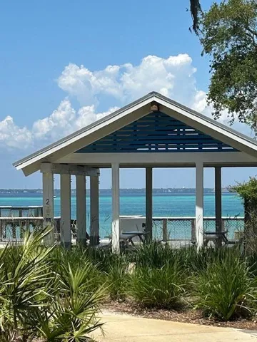 a view of a sign board with a park