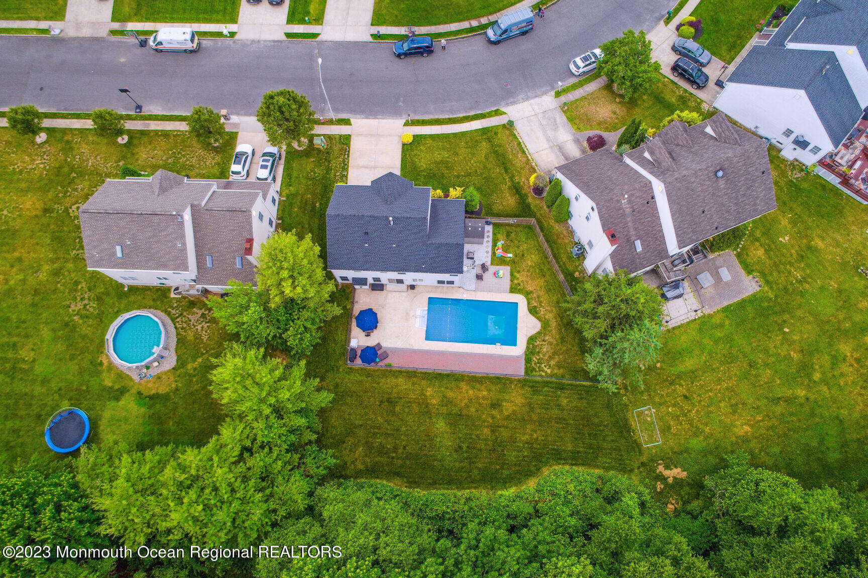 62 Gristmill Road Howell, NJ 07731 - Photo 3 of 29 an aerial view of a house with yard swimming pool and outdoor seating