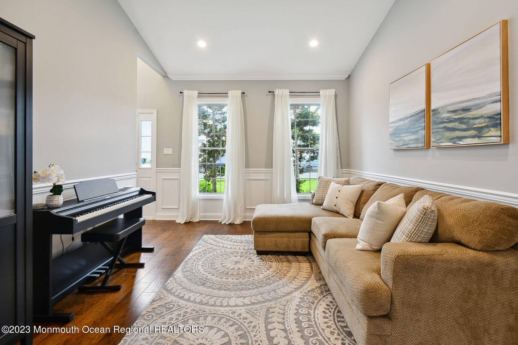 62 Gristmill Road Howell, NJ 07731 - Photo 6 of 29 a living room with furniture a large window and a flat screen tv