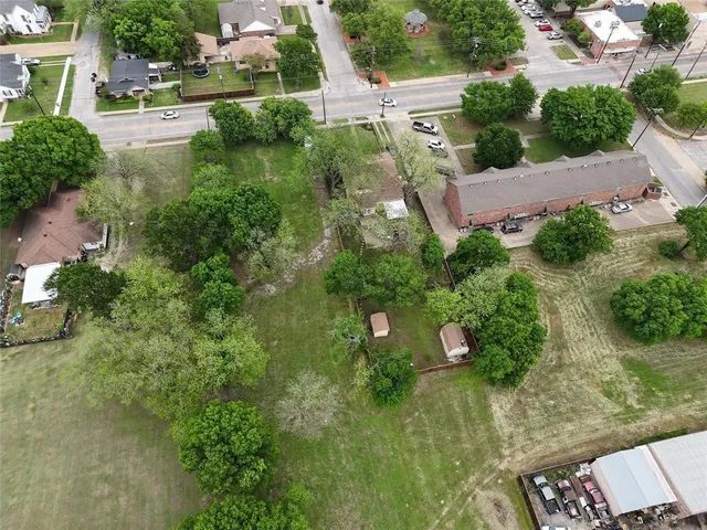 an aerial view of residential house with outdoor space