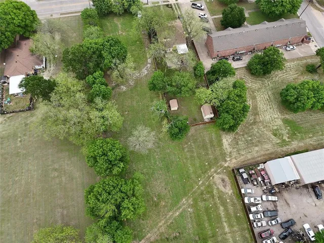 an aerial view of residential house with outdoor space